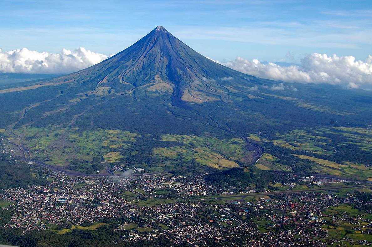 Mount Mayon and the city of Legazpi on the island of Luzon