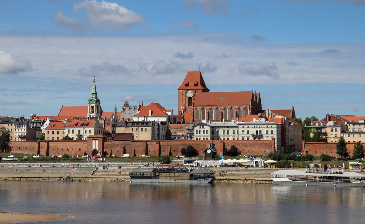 Panorama of the Medieval Town of Toruń on the Vistula River, with the city walls and Toruń Cathedral.