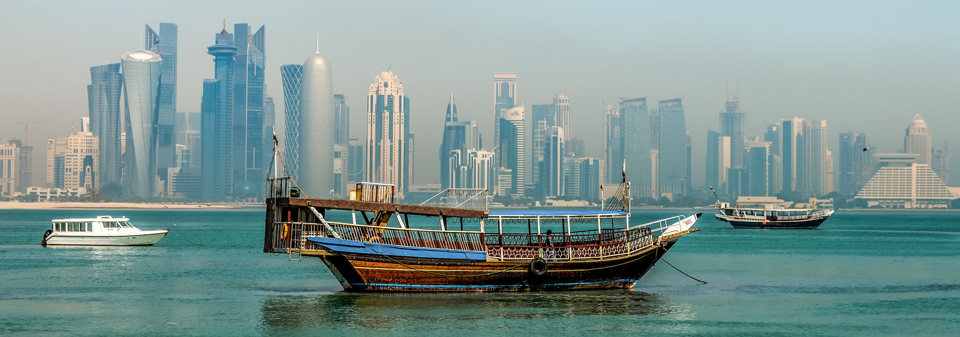 Doha skyline with Dhow.