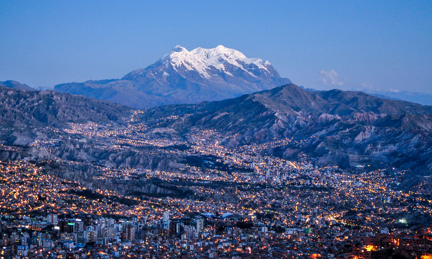 View of La Paz, Bolivia's capital city, with Illimani Mountain in the background.