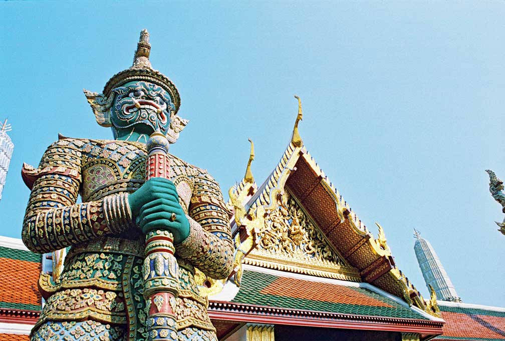 Giant demon (Yaksha) guarding an exit to Grand Palace in Wat Phra Kaew, Bangkok