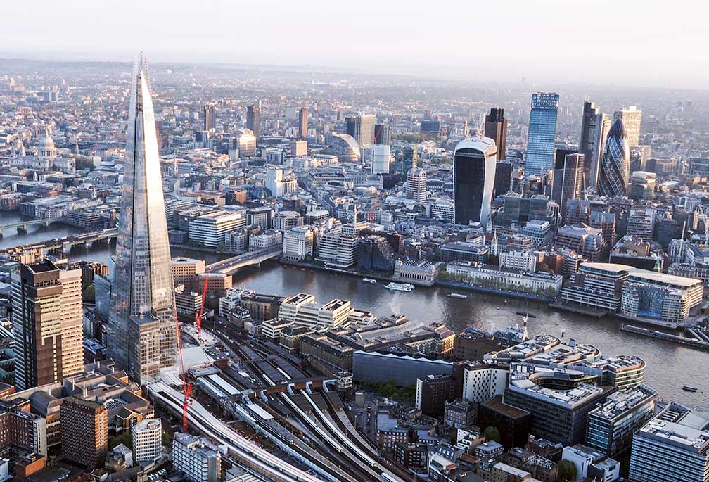 Central London seen from a hot air balloon, with River Thames, the Gherkin, the Shard, and London Bridge station