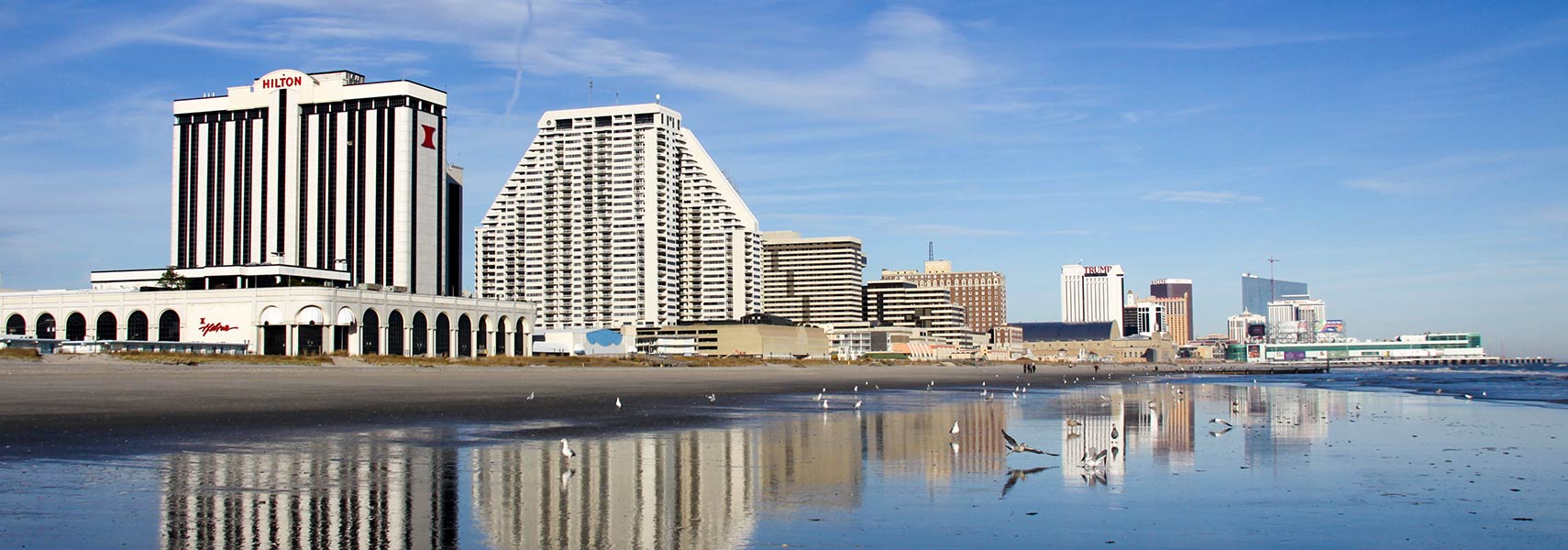 Casinos reflected on the sand in Atlantic City, NJ