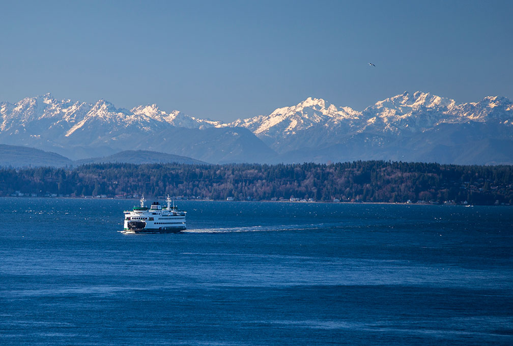 Ferry on Puget Sound with Cascade Mountain Range in Washington State