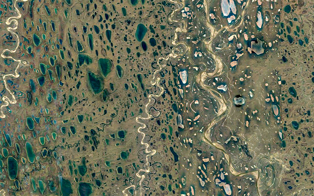 Satellite view of thaw ponds and rivers in the Far North of Alaska
