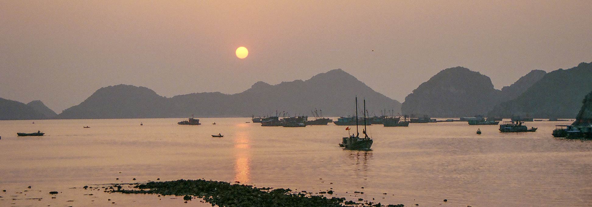 Sunset at Halong Bay from Cat Ba Island in Vietnam